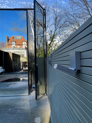 Modern glass and metal fence design