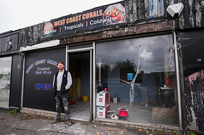 Exterior view of retail store front undergoing full electrical and interior refurbishment