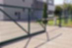 Sliding gate, green metal frame, automated opener