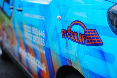 Close-up of branded blue electrical service van door with company logo