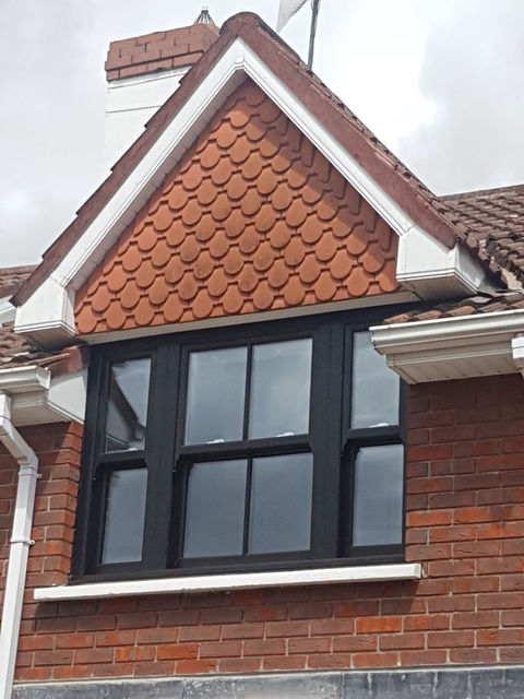 beautiful modern dormer window with black frames