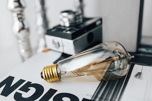 kaboompics_pencils-magazines-and-an-old-lightbulb-1725.jpg