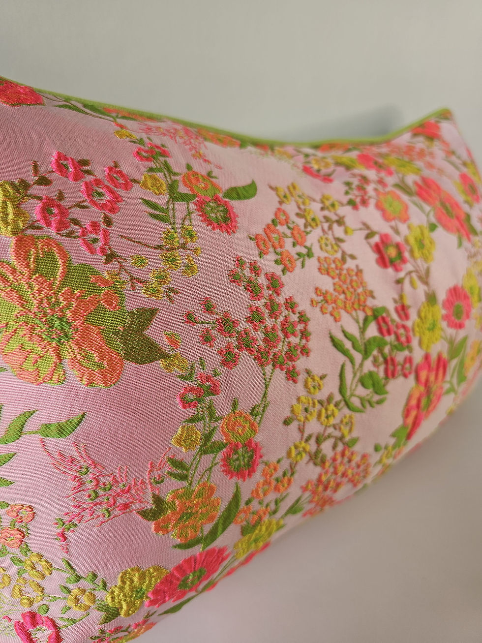 Thumbnail: Pink fabric with orange, yellow, green floral pattern