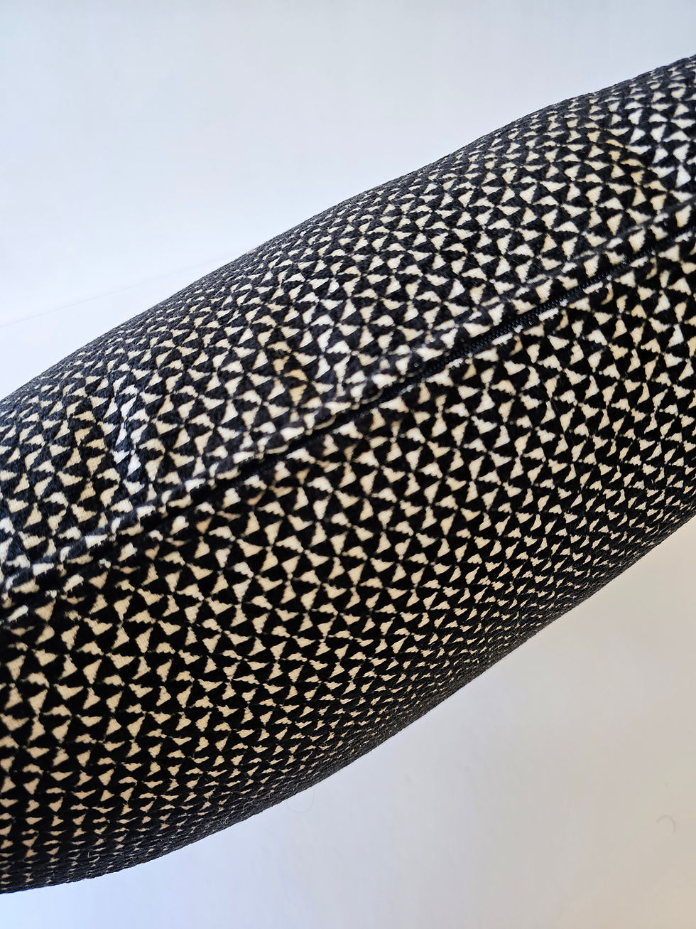 Thumbnail: Black and white pinwheel pattern on cylindrical fabric