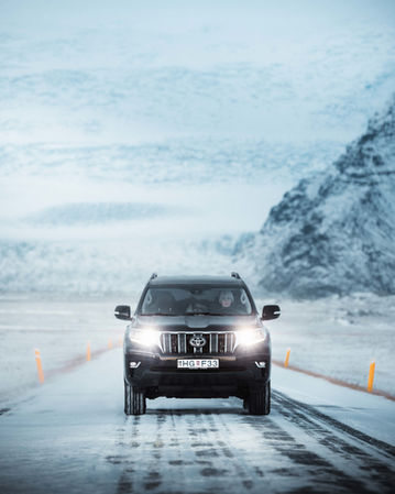 driving on icy roads with toyota land cruiser in iceland