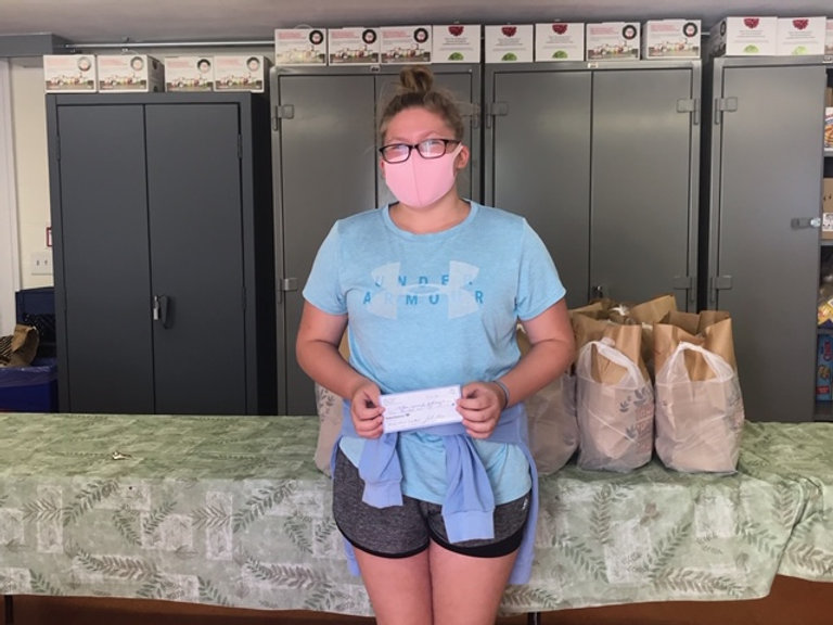 Lilly with donation from selling masks 2
