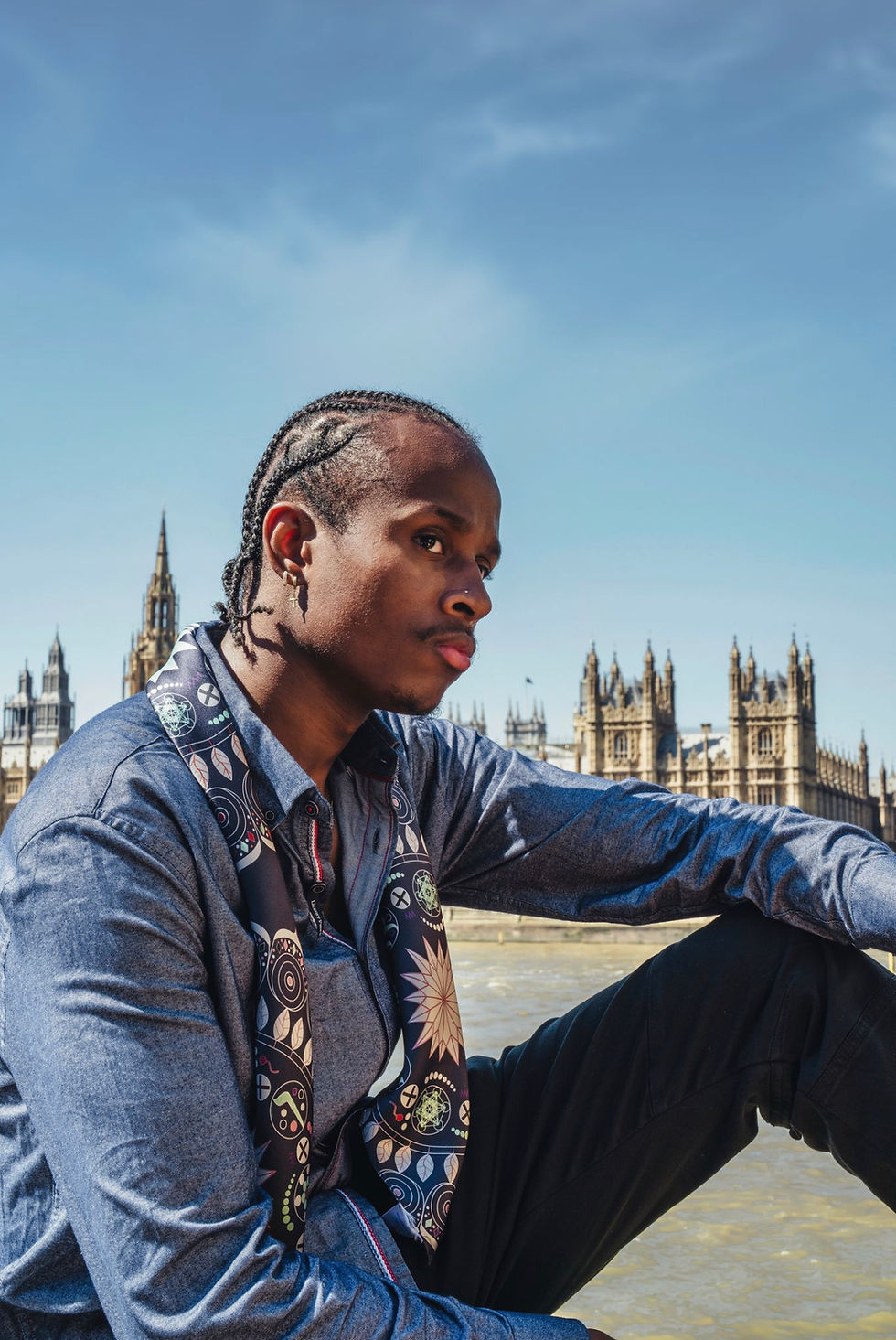 Thumbnail: man wearing luxury sapphire mandala silk scarf