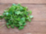 watercress on chopping board