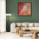 Thumbnail: Cosy pastel art in warm orange, yellow, pink, and blue pairing beautifully with green walls.