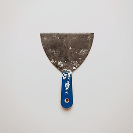 A singular paint scraper