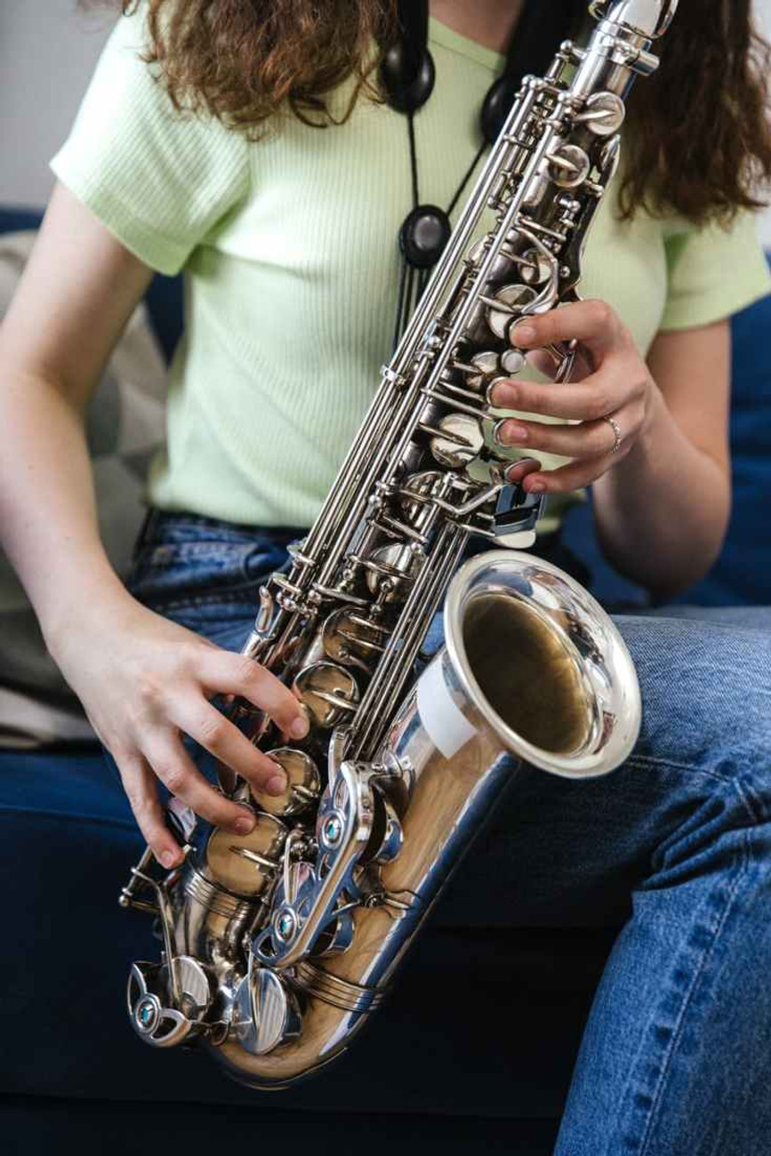 woman playing a saxophone