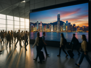 LED video wall inside a modern airport terminal displaying the Hong Kong skyline, with many tourists walking past in cinematic lighting.