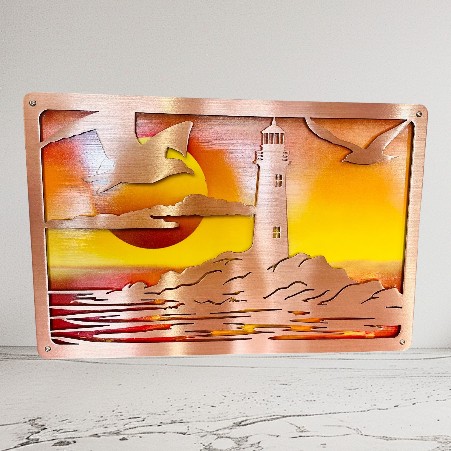 Layered sunset lighthouse scene 