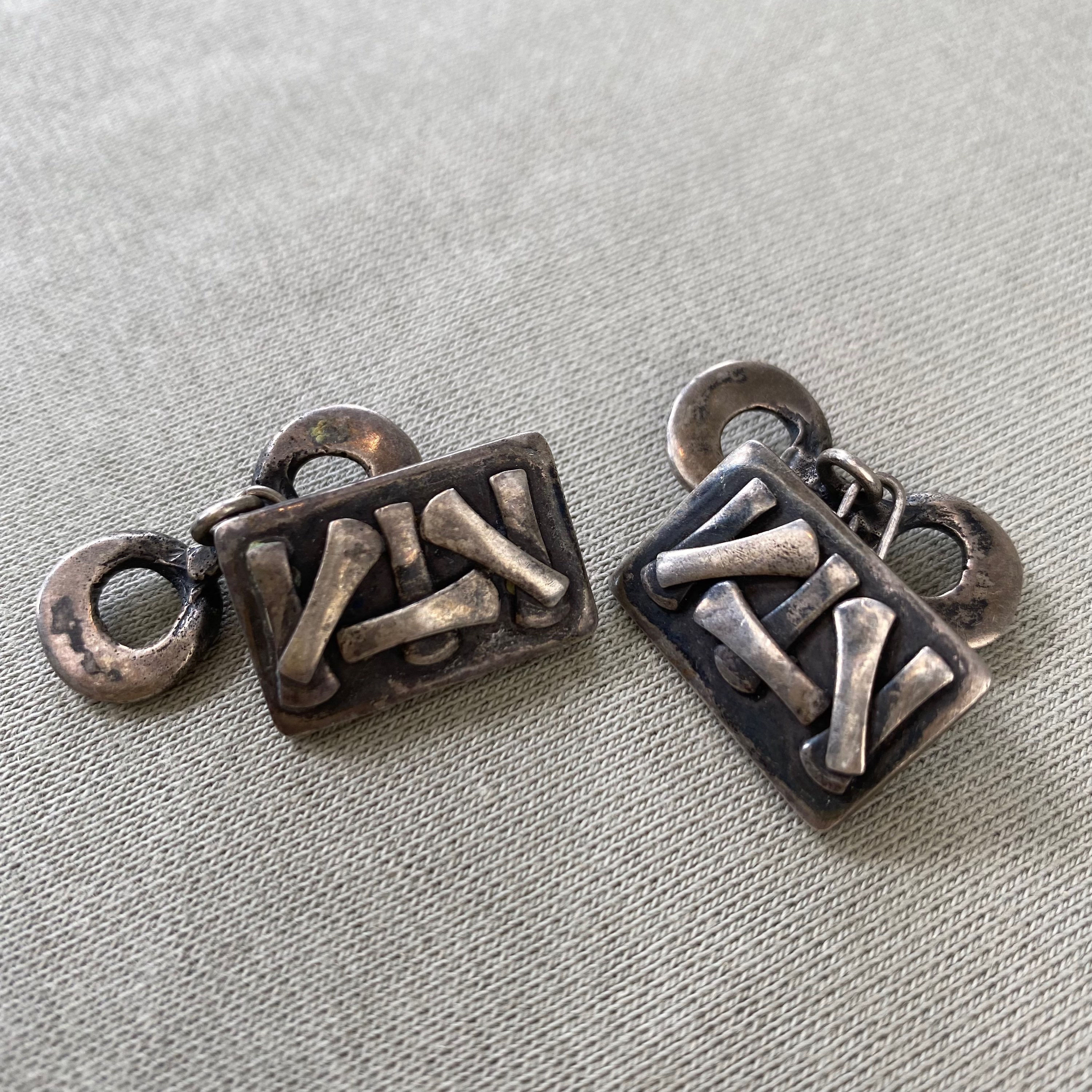 Mansjettknapper i tinn