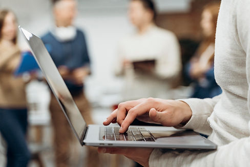 man-working-laptop-while-standing.jpg