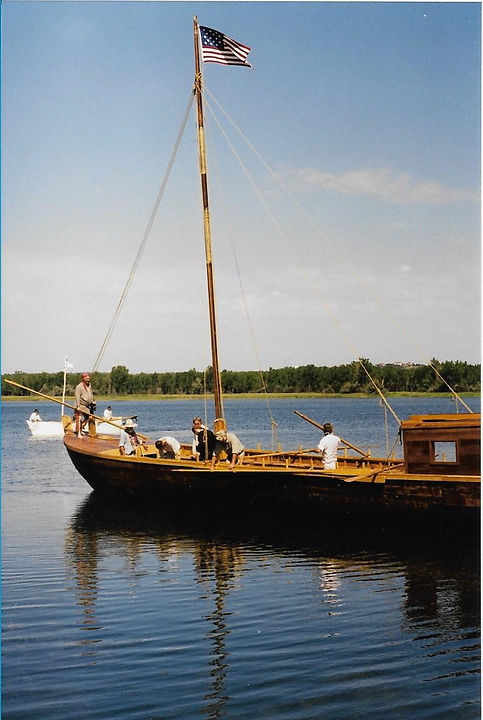 Keelboat and white pirogue in background.jpg