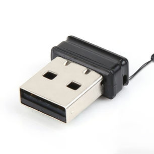 The image shows a small USB stick