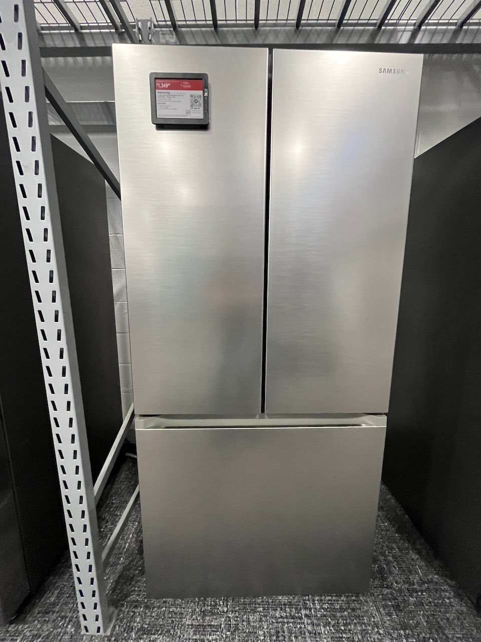 Our new residential refrigerator was found at the Sandusky Best Buy. This counter-depth unit's dimension would fit our trailer, but I would need to remove our bottom storage drawer to accommodate the new height.