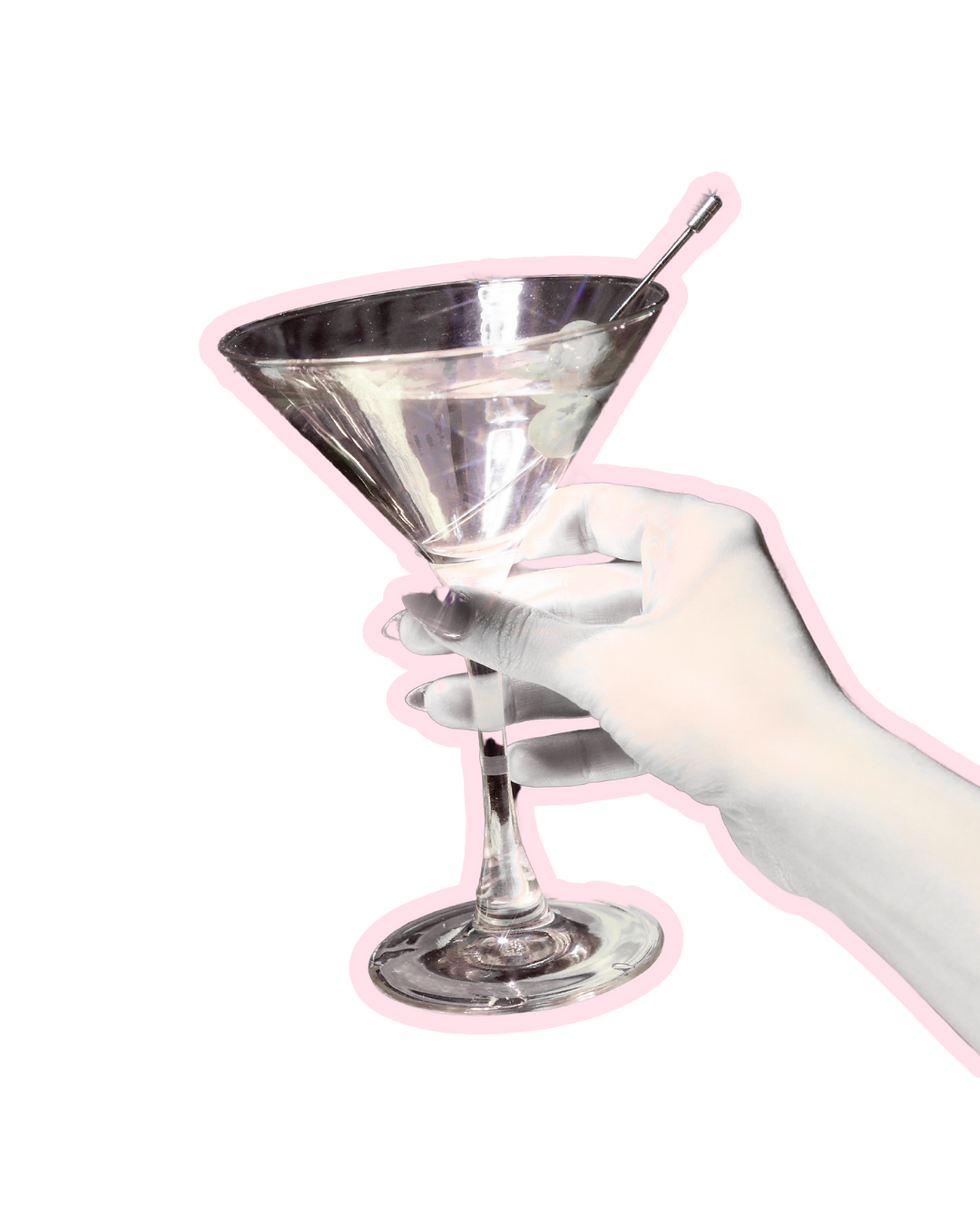 Social media manager hand holding a Martini glass