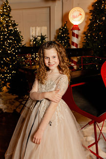 Christmas portrait of little girl, girl in Christmas dress