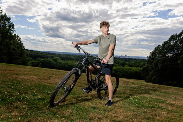 senior portrait on mountain bike