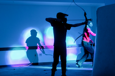 archery tag photography in a dark room