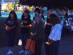 Group with Janet IOAD candles.jpg