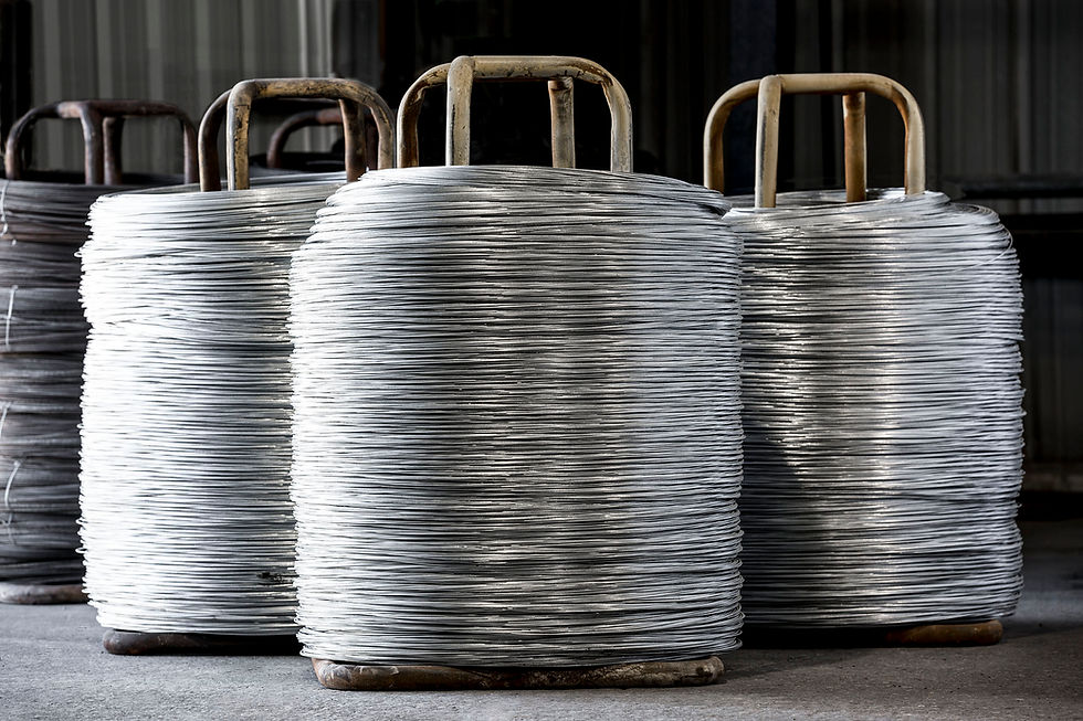 A full carrier, or stand, of wet black annealed steel wire.