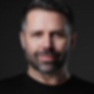 Professional headshot of a handsome man 