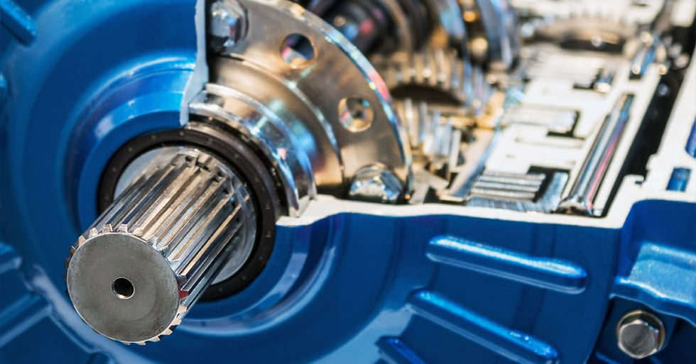 A close-up view shows that a blue gearbox is partially open, exposing the metal gears and parts inside.