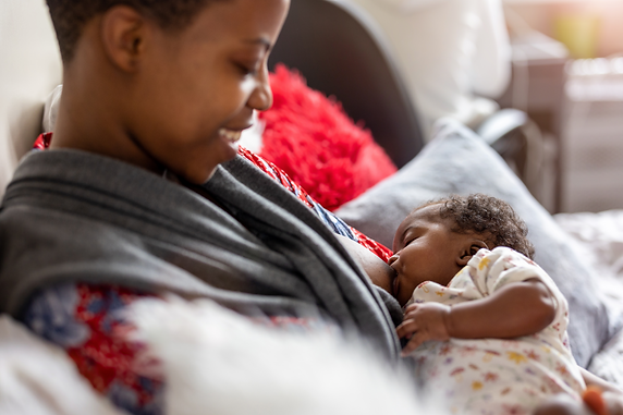 black woman breastfeeding her baby.png