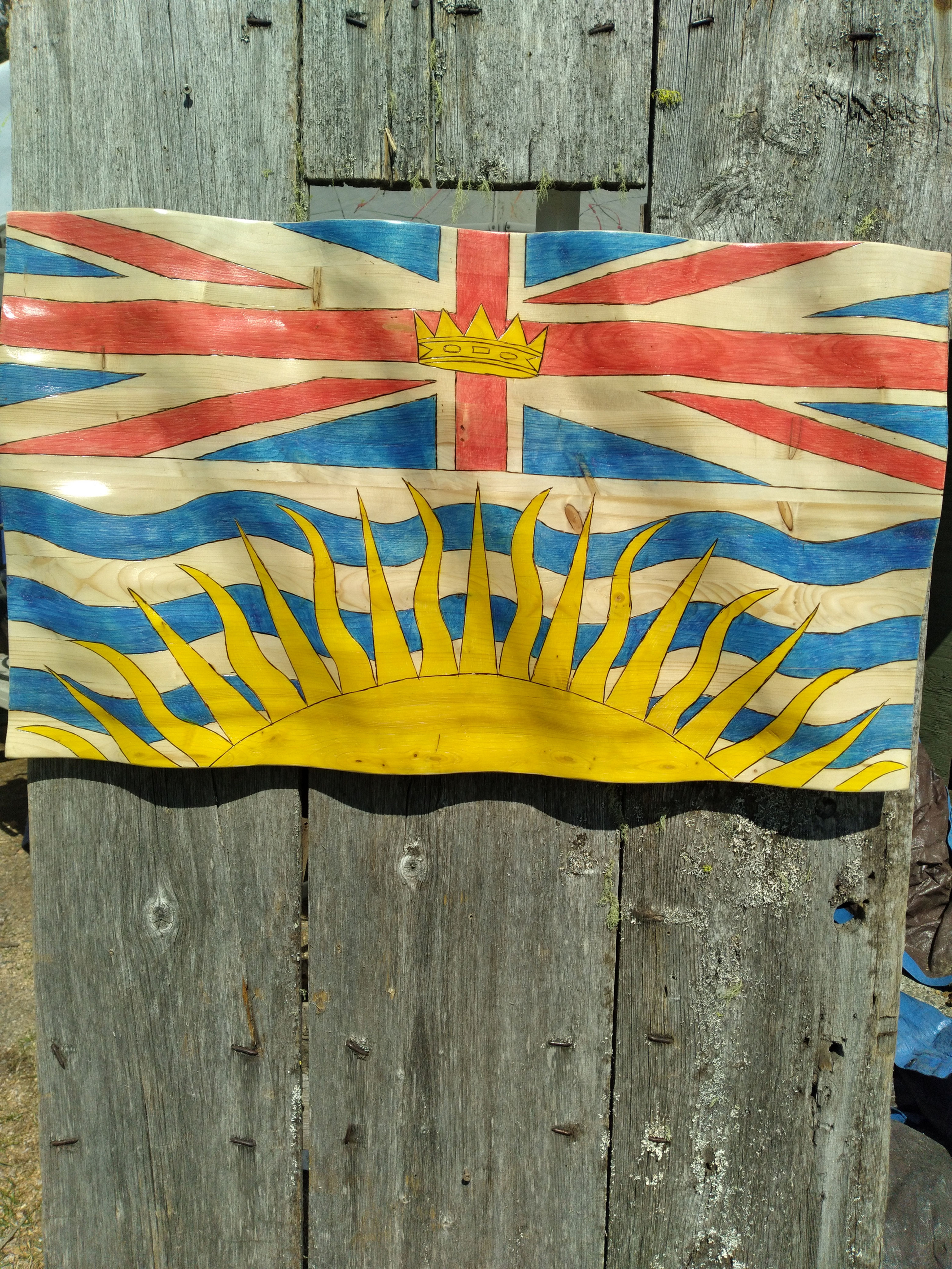 wooden waving British Columbia flag
