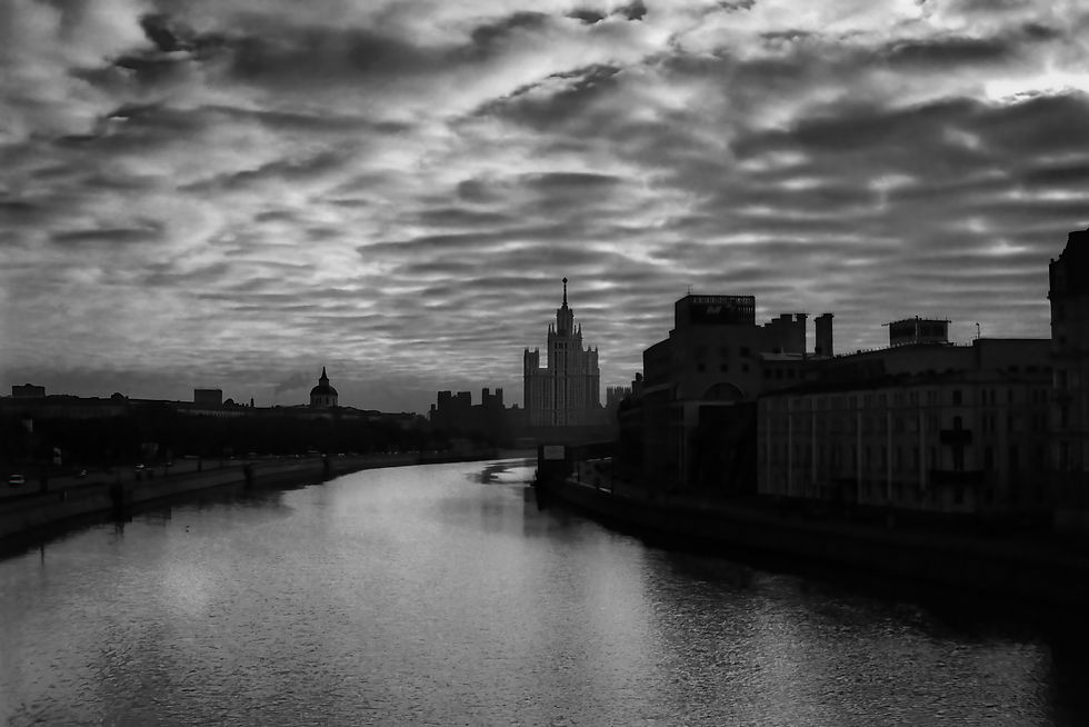 an ominous sky over Moscow and the Moskva River in black and white.