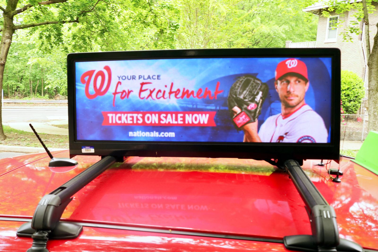 Rooftop display running a baseball ticket campaign