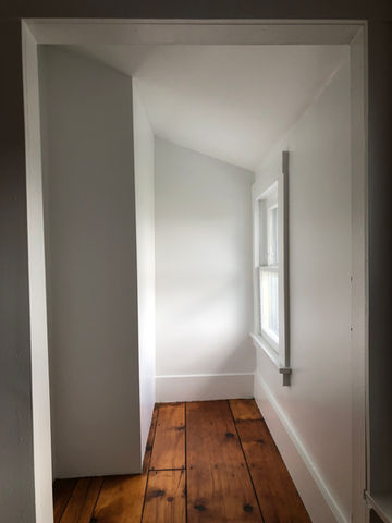 Hallway after drywall repair and painting in Canandaigua NY