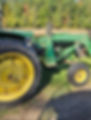 Green tractor at Sterling Pointe Farm Photos gallery