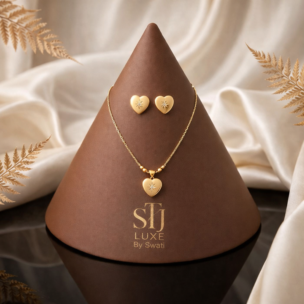 SLJ LUXE by Swati gold heart necklace and earrings