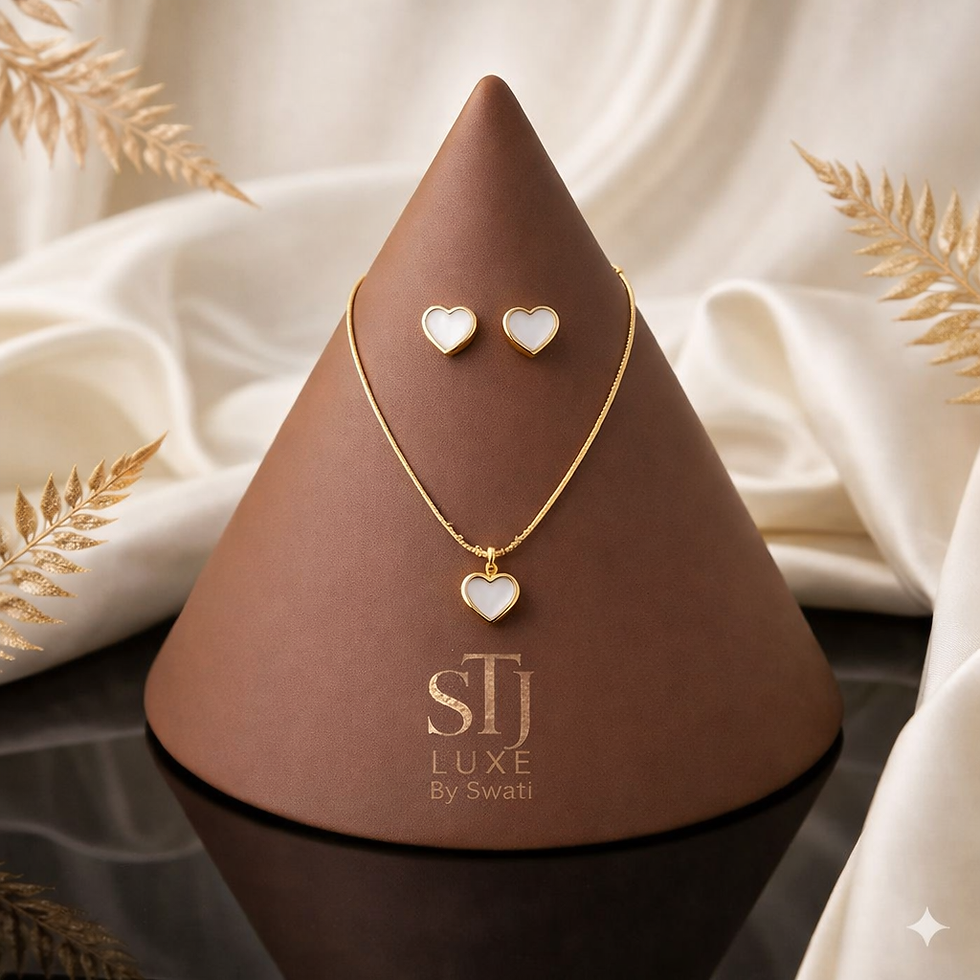 Gold white heart necklace and matching earrings. sTj LUXE by Swati.