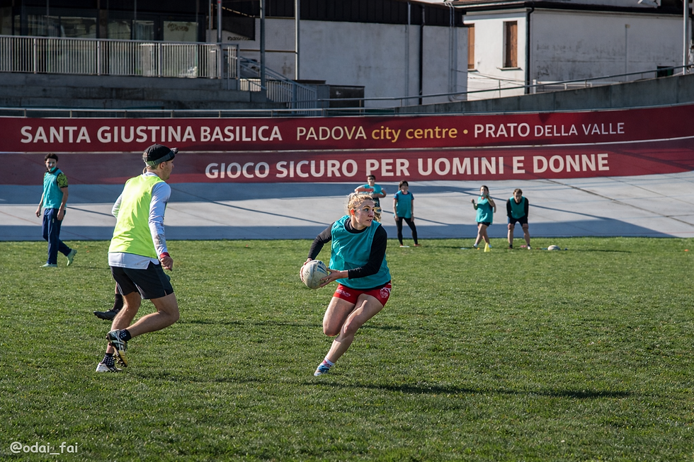 Touch rugby, a safe sport for males and females.