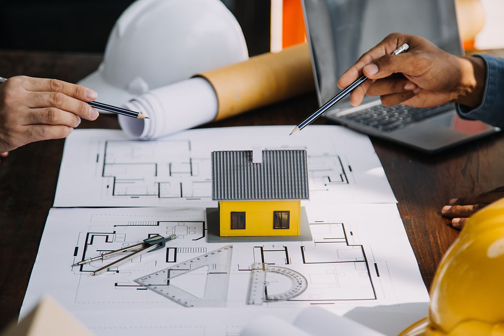 vecteezy_engineer-teamwork-meeting-drawing-working-on-blueprint_26571577.jpg