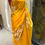 Thumbnail: Yellow  Georgete saree with Lahriya stone work 
