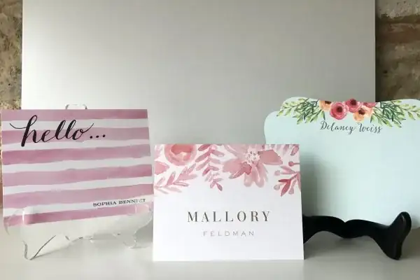 Folded note cards and stationery with floral and striped designs