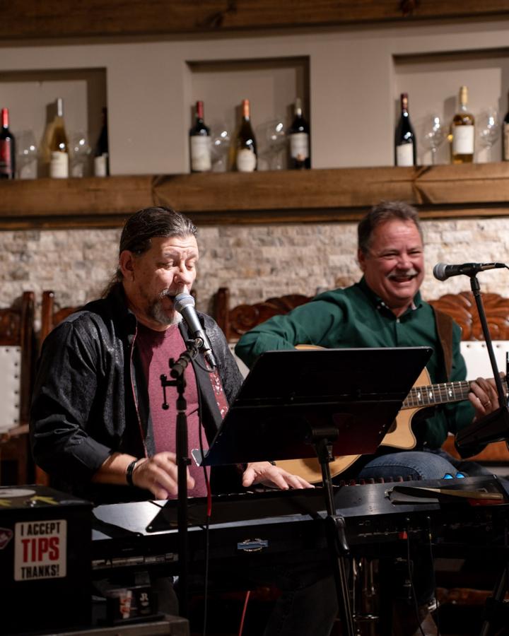 Joey on keyboard and Patrick on guitar performing at The 1800 in Americus