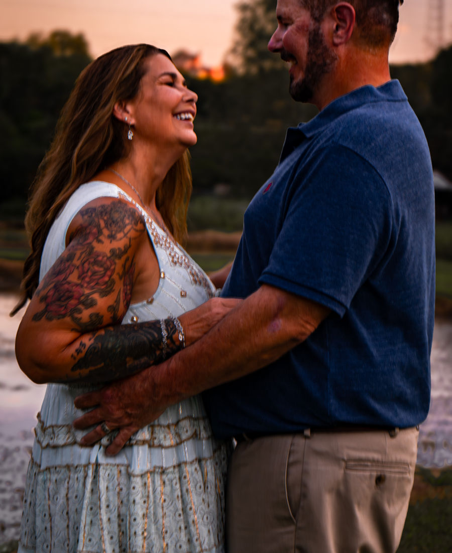 Couple hugging outdoors