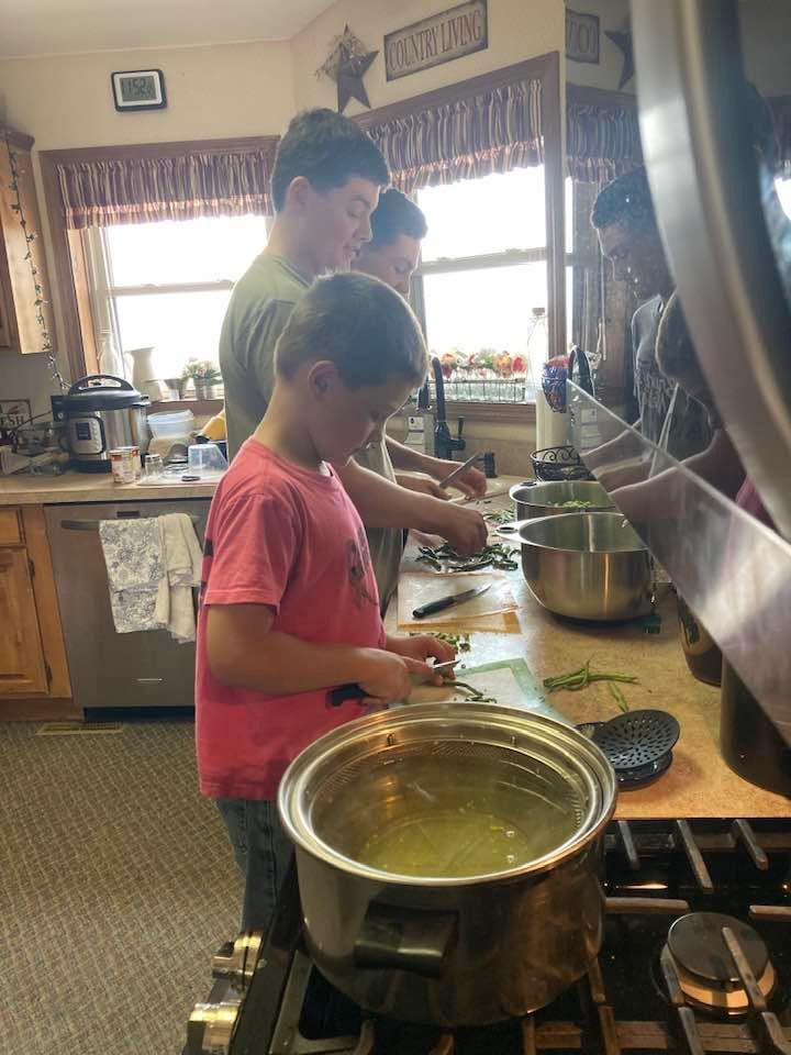 Those boys are actually putting up beans in this picture, but we use the same set-up for all sessions of blanching.