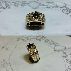 top and side view of a custom hand engraved white gold ring with a sapphire solitaire