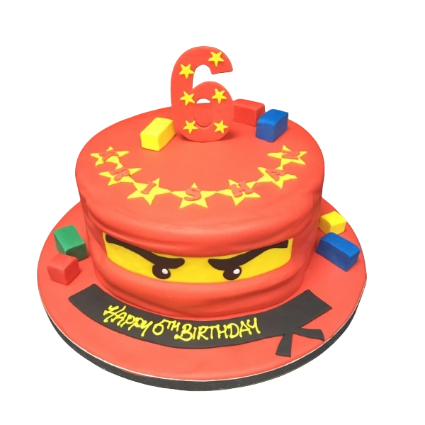 A Ninjago Lego head-shaped cake with intricate detailing and bright vivid colors, perfect for fans of the popular action-packed toy and TV series.