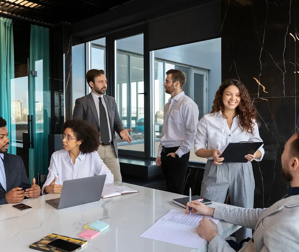 A professional team collaborating in a modern office, showcasing how Confetti Recruitment helps businesses beat the hiring crisis by finding the right offshore staffing solutions.