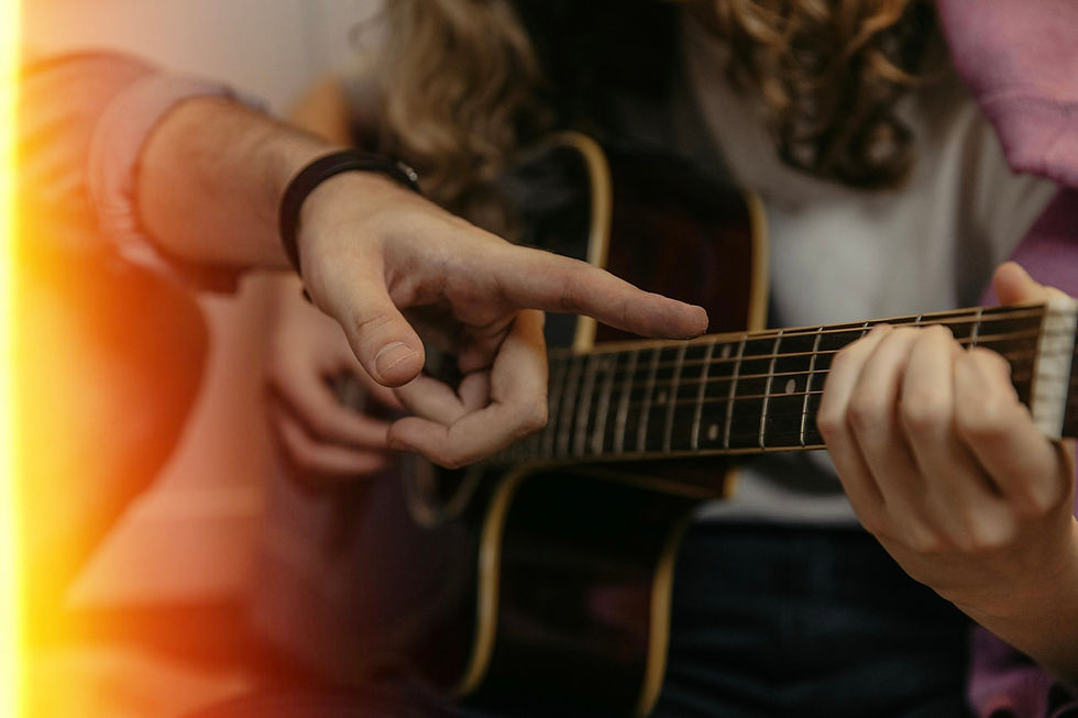 Why You Should Take Guitar Lessons vs. Teaching Yourself