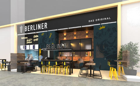 Terrasse et vitrine d'un restaurant Berliner aménagé par un décorateur de restaurant